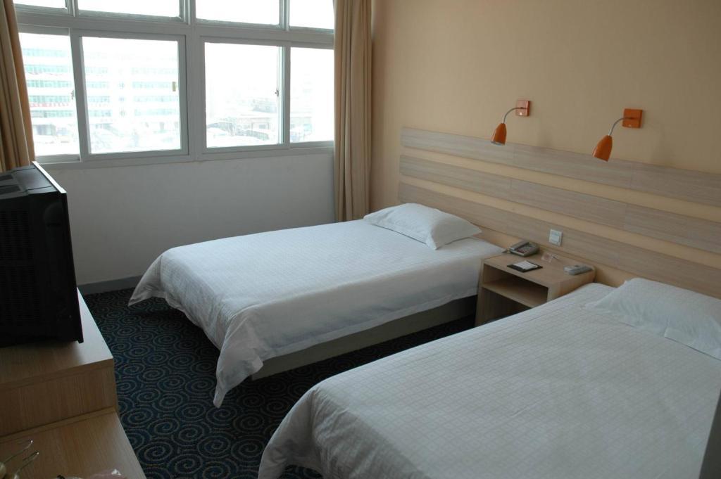 Zhongzhou Hotel - Jingu Road Lojang Szoba fotó